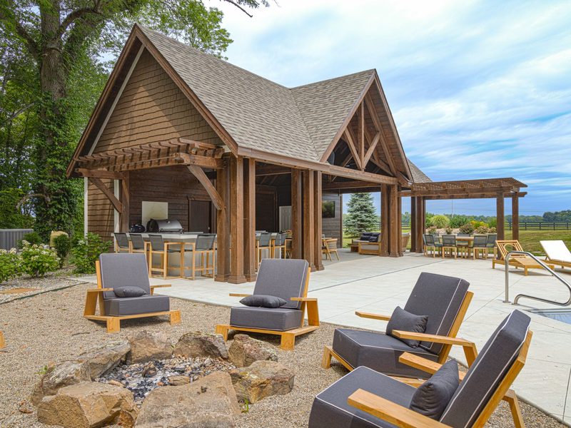 A timber-frame project shown on Homestead Barns' pergola page